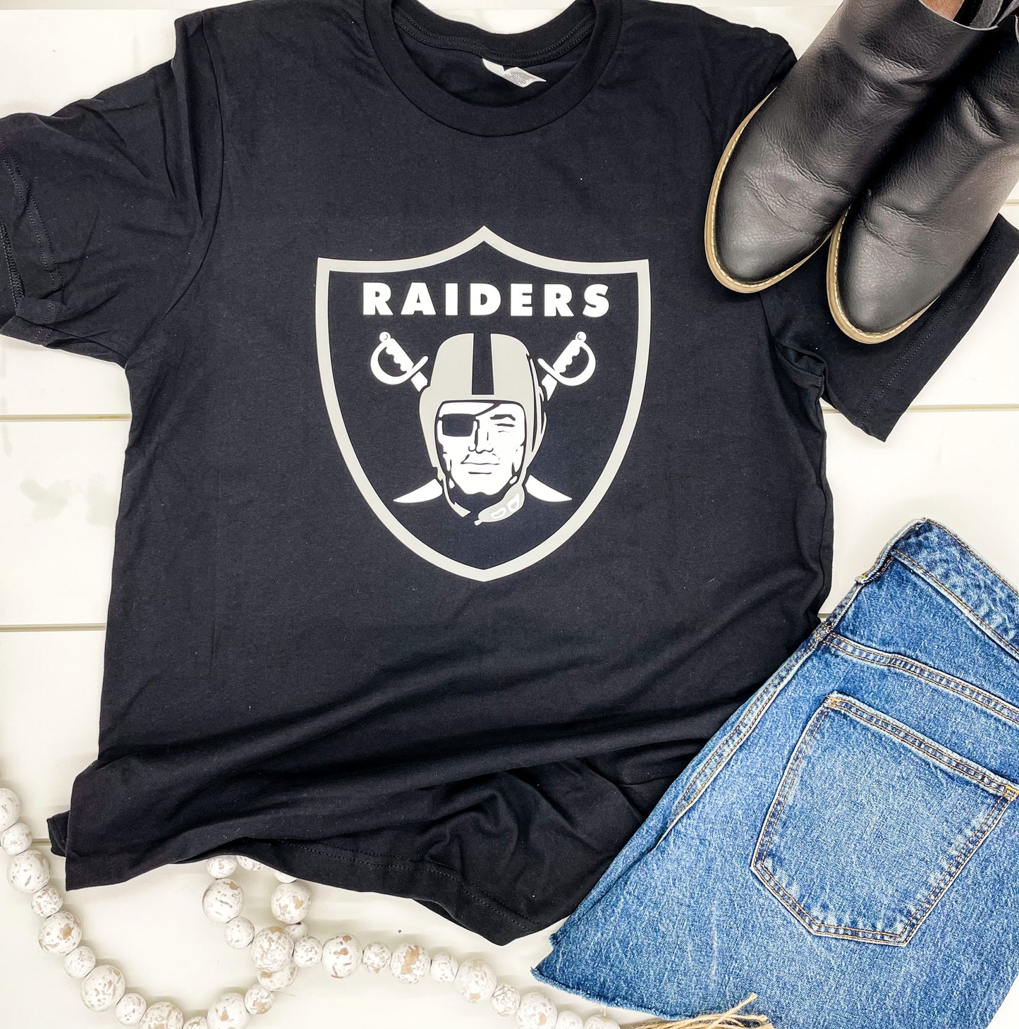 Black and gray Raiders Logo